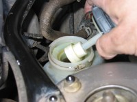 Brake fluid is held in a special reservoir clearly marked BRAKE FLUID. Do not refill with anything except the manufacturer's recommended brake fluid.