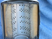 This cutaway of a car oil filter shows construction.