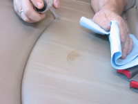 Apply the appropriate cleaner to the spot. (Your auto parts store clerk can help you select the best cleaner.)