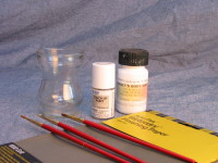 Auto parts stores have touch-up paint in common colors. For specific colors, take a sample from your car (like the gas fill cover) to a specialty auto paint shop for an exact match.
